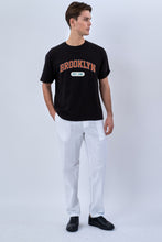 Cargar imagen en el visor de la galería, Oversized T-shirt with print - Black
